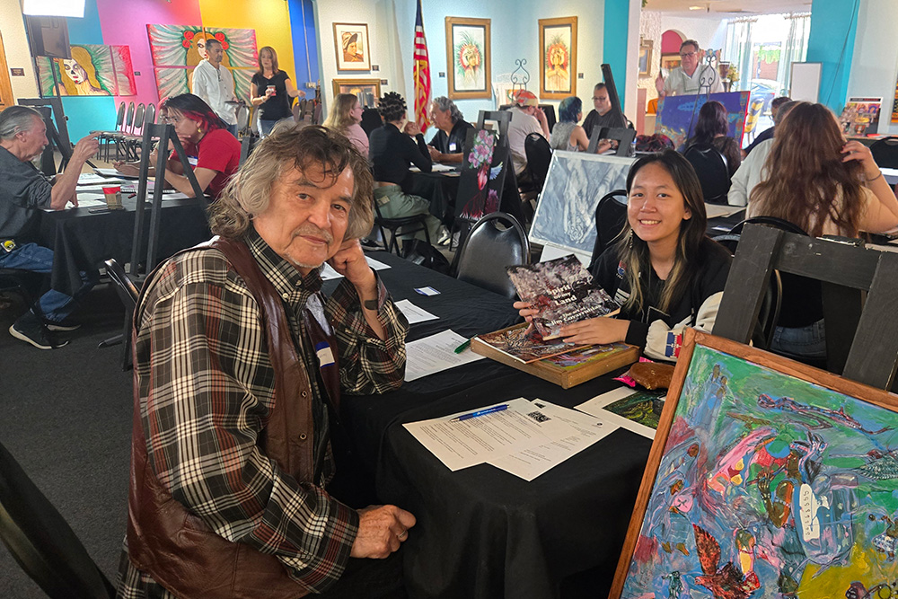 People collaborating at the Arizona Latino Arts and Cultural Center
